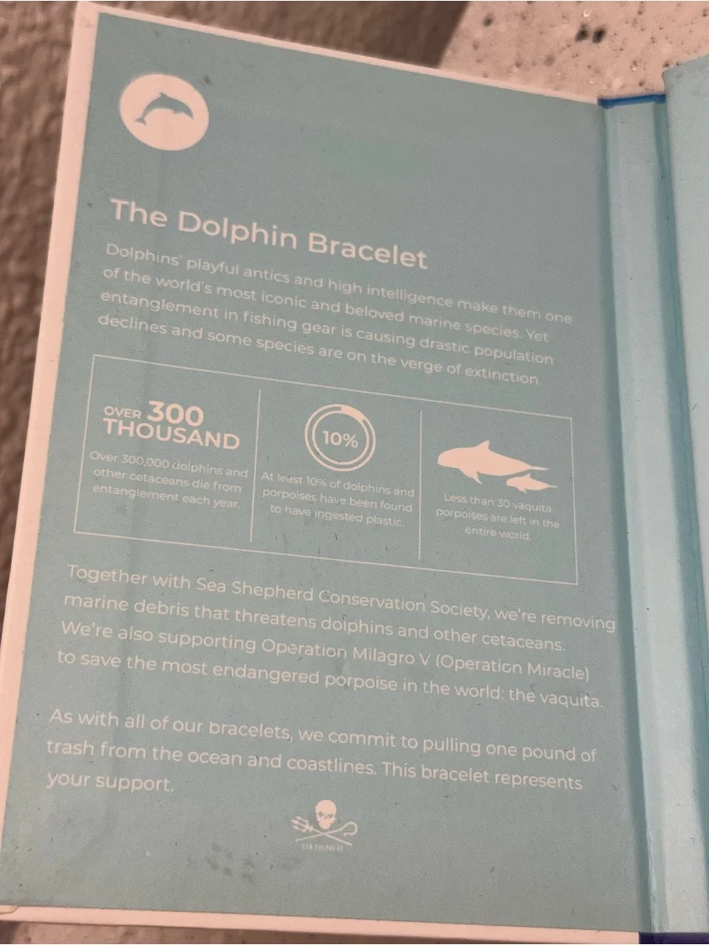 Bracelet from 4ocean, specifically designed for dolphin conservation.